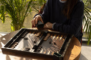 Backgammon in a wooden case (52 x 43.5 cm)